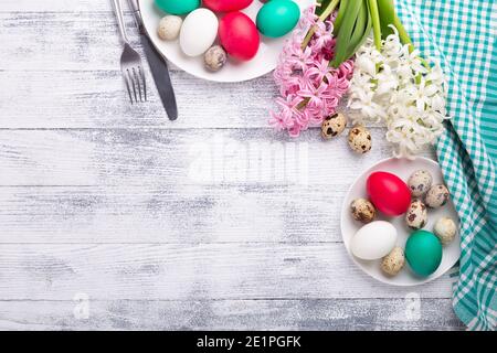 Easter eggs, pink and white hyacinth on wooden background. Easter concept. Top view. Copy space - Image Stock Photo