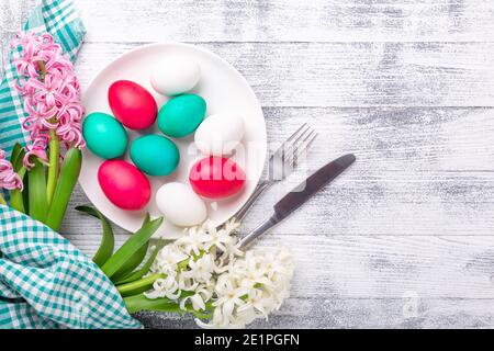 Easter eggs, pink and white hyacinth on wooden background. Easter concept. Top view. Copy space - Image Stock Photo