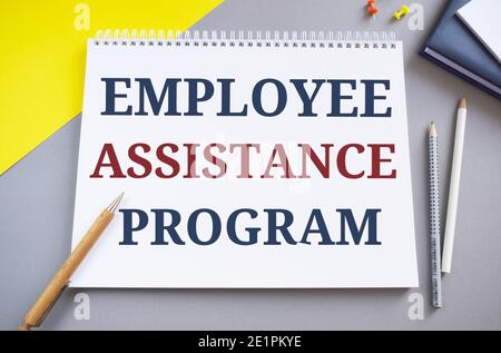 Employee Assistance Program business text concept. Employee assistance program text written in Notebook. Stock Photo