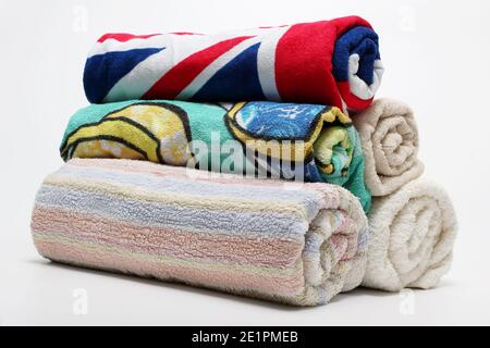 Rolls of Towels on White Background Stock Photo