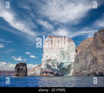 Santorini - The white rock towers from south part of the island. Stock Photo