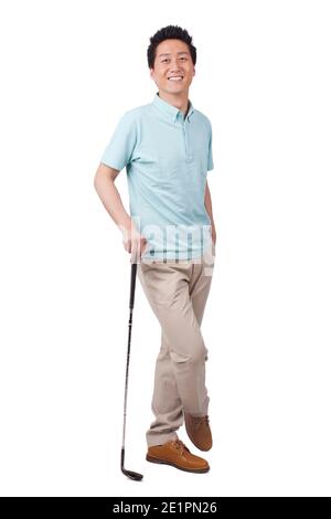Young man holding golf swing and smiling high quality photo Stock Photo