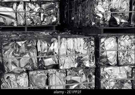unpainted aluminum scraps pressed in cubes, black and white photography Stock Photo