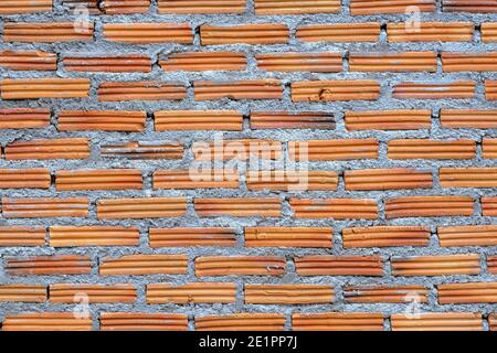 Orange brick wall background with rough gunge texture. Stock Photo