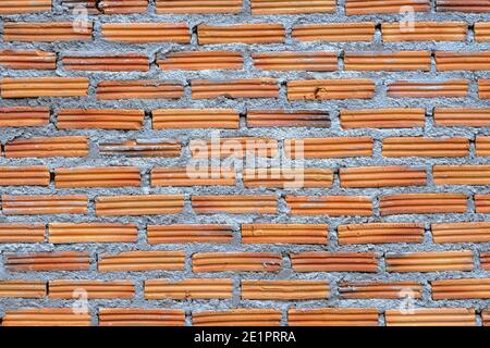 Orange brick wall background with rough gunge texture. Stock Photo