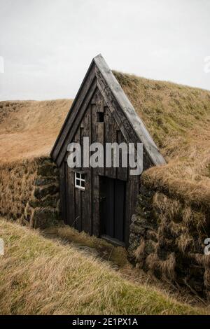 Panorama view of historical traditional green grass Keldur Turf House sod nature farm museum Hella in South Iceland Stock Photo