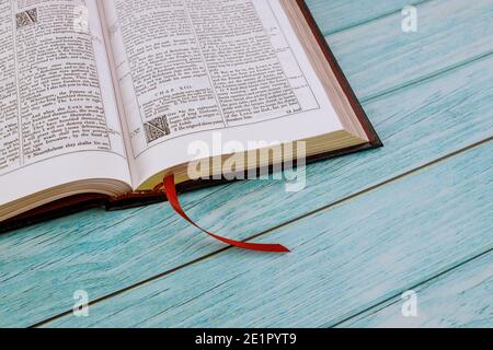 07 JANUARY 21 New York US 2021: Desk table opened the Holy Bible close up prayer time Stock Photo