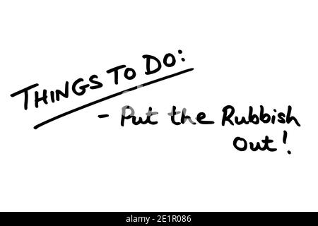 Things To Do - Put the Rubbish Out! handwritten on a white background. Stock Photo
