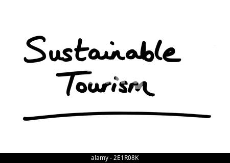 Sustainable Tourism handwritten on a white background. Stock Photo