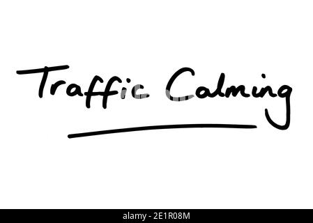 Traffic Calming handwritten on a white background. Stock Photo