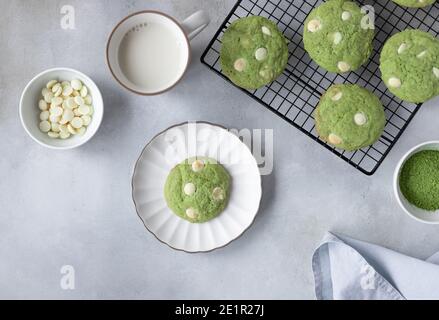 flat lay composition with green tea matcha cookies and cup of almond milk Stock Photo