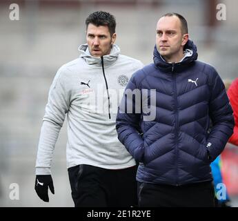 Hamburg, Germany. 09th Jan, 2021. Football: 2nd Bundesliga, Matchday 15, FC St. Pauli - Holstein Kiel at Millerntor Stadium. Kiel's coach Ole Werner (r) and co-coach Fabian Boll leave the pitch at half-time. Credit: Christian Charisius/dpa - IMPORTANT NOTE: In accordance with the regulations of the DFL Deutsche Fußball Liga and/or the DFB Deutscher Fußball-Bund, it is prohibited to use or have used photographs taken in the stadium and/or of the match in the form of sequence pictures and/or video-like photo series./dpa/Alamy Live News Stock Photo