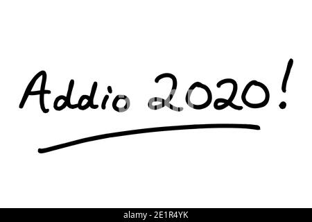 Addio 2020! - meaning Goodbye 2020! in the Italian language - handwritten on a white background. Stock Photo