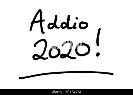 Addio 2020! - meaning Goodbye 2020! in the Italian language - handwritten on a white background. Stock Photo