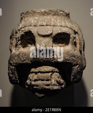 Head that decorated a Mayan building in the Puuc style. Late Classic Period (600-900 AD). Stone. Mayan Culture. Uxmal, Yucatan, Mexico. Museum of the Americas. Madrid, Spain. Stock Photo