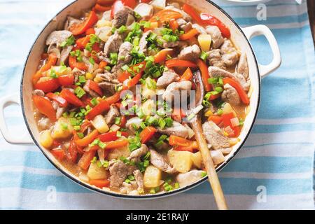 Sweet and sour Chinese chicken with pineapple, red pepper, chives Stock Photo