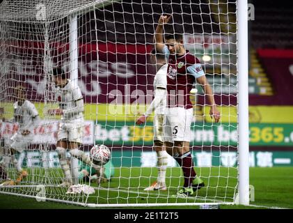 Burnley's Matej Vydra (not pictured) scores his side's first goal of the game as team-mate James Tarkowski celebrates the goal during the Emirates FA Cup third round match at Turf Moor, Burnley. Stock Photo