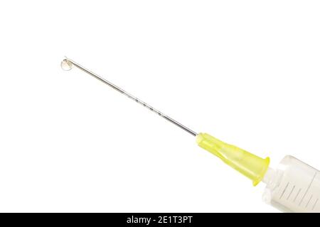 COVID-19 vaccine injection, syringe with corona serum, close up, free copy space, symbol picture Stock Photo