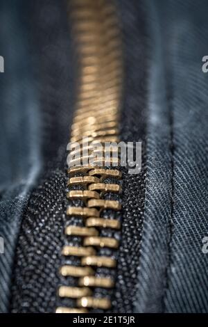 Macro zipper in the downhill on blurred background Stock Photo