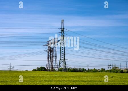 Power lines and electricity pylons seen in Germany Stock Photo