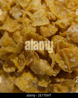 Full frame background close up image of golden sugary breakfast cereal Stock Photo