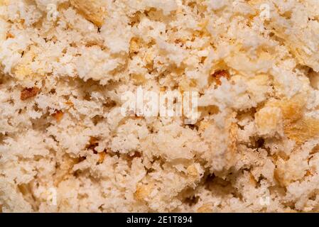 Winter food for birds. Crumbled bread close-up. The concept of helping animals Stock Photo