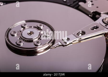 Macro view of spindle of the open hard disk drive, HDD, detail Stock Photo