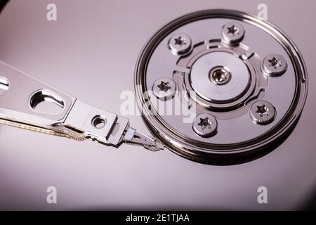 Macro view of spindle of the open hard disk drive, HDD, detail Stock Photo