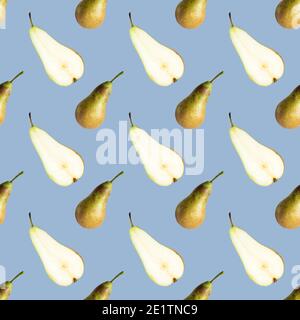 Seamless pattern with green whole pear and half on a blue background. Stock Photo
