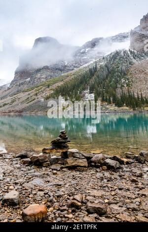 stone stacking, Moraine Lake, Banff National Park, Canada Stock Photo