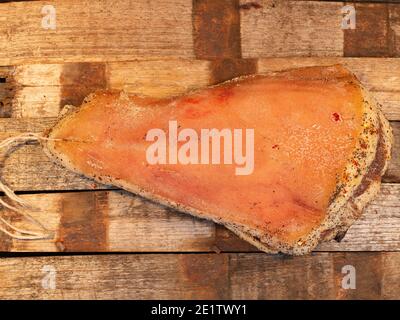 italian guanciale pork cheek on a wooden board. main ingredient for  carbonara and matriciana Stock Photo - Alamy