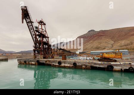 The jetty at Pyramiden, abandoned Russian mine and its associated town on Svalbard. Stock Photo