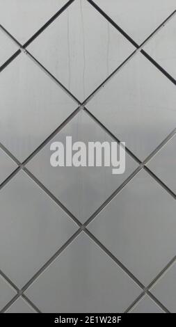 The exterior of the building - cladding with metal diamond sheets Stock Photo