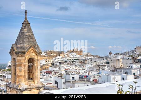 View of the old white town of Ostuni and the cathedral at sunrise. Brindisi, Apulia in southern Italy. Europe. Stock Photo