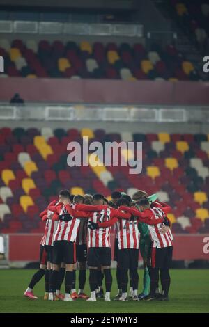Brentford, UK. 07th Jan, 2021. LONDON, ENGLAND. JAN 9th Brentford squad stands during the FA Cup match between Brentford and Middlesbrough at the Brentford Community Stadium, Brentford on Saturday 9th January 2021. (Credit: Federico Maranesi | MI News) Credit: MI News & Sport /Alamy Live News Stock Photo