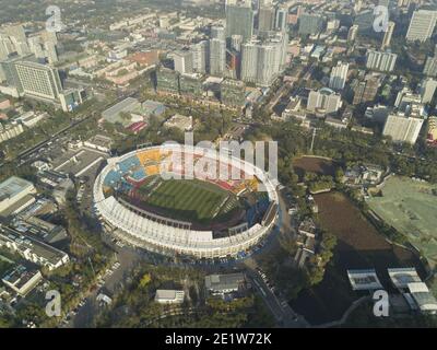 Aerial view of the city skyline with buildings and high rises on a day with light smog in the Dongcheng and Chaoyang district of the Chinese capital city of Beijing, China, PRC. © Time-Snaps Stock Photo