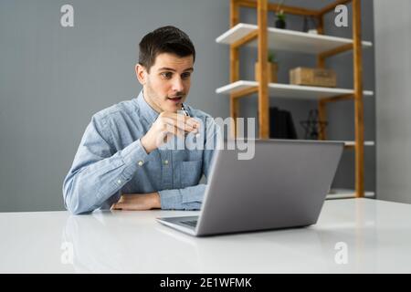 Virtual Smoking Break Using Electronic Cigarettes And Video Conference Stock Photo