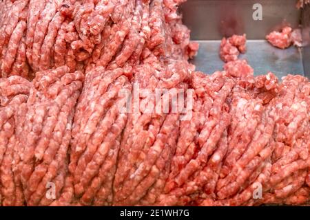 Close-up of minced meat sucking in a supermarket Stock Photo