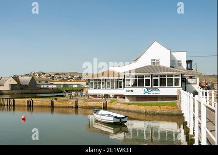 BRIDPORT, DEVON, UK - MARCH 19, 2009:  Exterior view of the Riverside Restaurant at West Bay Stock Photo