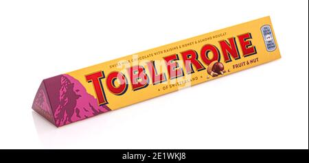 SWINDON, UK - JANUARY 10, 2021: Toblerone Fruit and Nut  Milk chocolate bar on white background Stock Photo