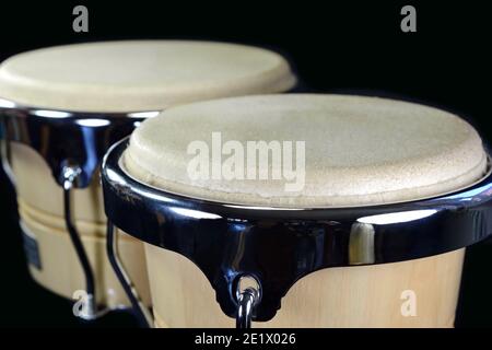 Set of Bongo Drums Isolated on Black Background. Latin percussion. Stock Photo