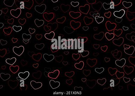 Multicolored red hearts on a black background. Ornament love symbol, Valentine's Day. Stock Photo