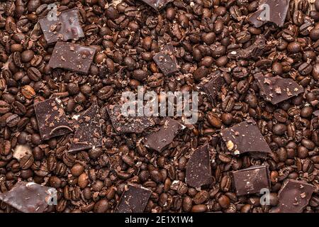 Background with chocolate and coffee beans and shavings. The view from the top. Stock Photo