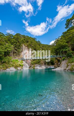 Bridge at the Blue Pools rock pools, Makarora River, turquoise crystal clear water, Haast Pass, West Coast, South Island, New Zealand Stock Photo