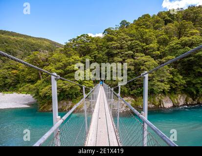 Suspension Bridge, Blue Pools Rock Pool, Makarora River, turquoise crystal clear water, Haast Pass, West Coast, South Island, New Zealand Stock Photo