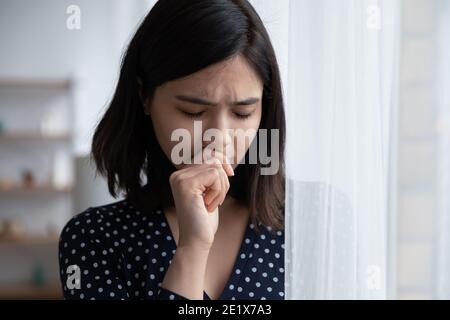 Frustrated young vietnamese asian woman suffering from psychological problems. Stock Photo