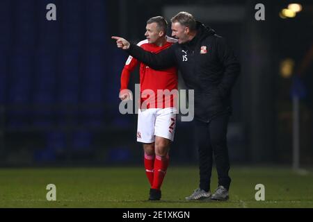 Manager of Swindon Town, John Sheridan and Paul Caddis of Swindon Town - Ipswich Town v Swindon Town, Sky Bet League One, Portman Road, Ipswich, UK - 9th January 2021  Editorial Use Only - DataCo restrictions apply Stock Photo