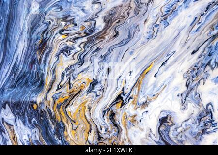 Blue quartz with yellow and white inlays. Natural quartz background and texture. Stock Photo