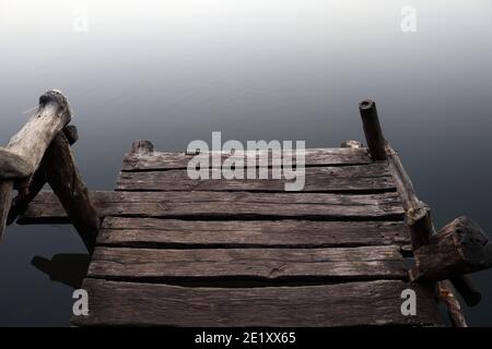 Wooden lake bridge Stock Photo