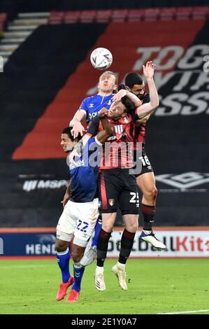 OLDHAM, ENGLAND. JAN 9TH Oldham Athletic's Carl Piergianni and Oldham Athletic's Raphaël Diarra tussles with Jack Simpson of Bournemouth during the FA Cup match between Bournemouth and Oldham Athletic at the Vitality Stadium, Bournemouth on Saturday 9th January 2021. (Credit: Eddie Garvey | MI News) Stock Photo